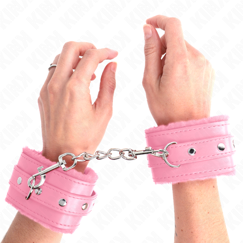 KINK - APPUI-POIGNETS DOUBLÉS DE FOURRURE PREMIUM ROSE AVEC CEINTURE ROSE RÉGLABLE 17-29 CM X 6 CM KINK WRIST RESTRAINT