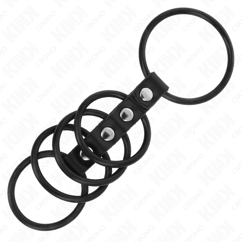 KINK - 5 ANNEAUX PÉNIS EN SILICONE DE 3,8 CM À 4,8 CM CONNECTÉS PAR DU CUIR KINK RING POWER